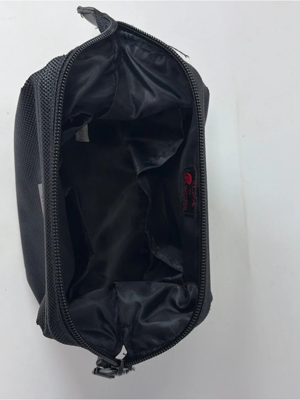 Tumi Black Textile Toiletry Pouch with Red AirBerlin Logo Accent